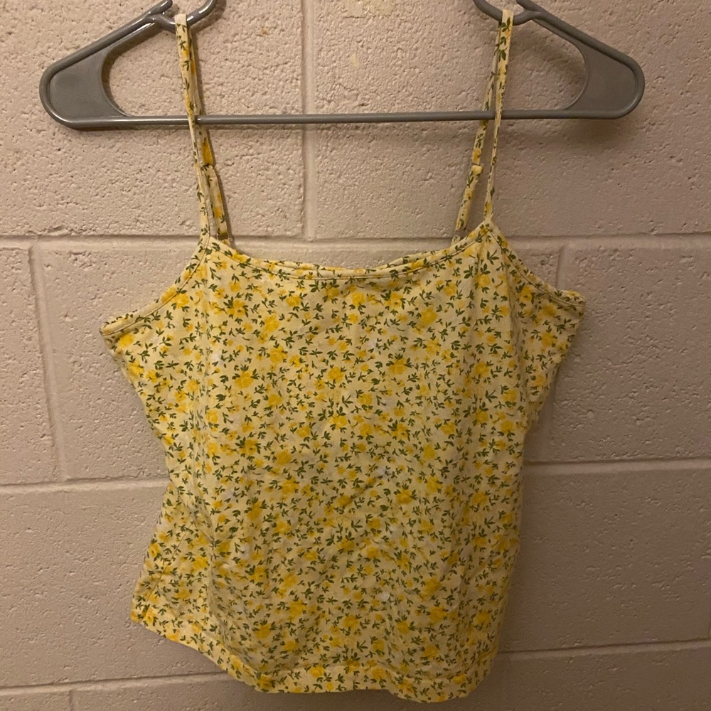 Yellow tank top with flowers  on it